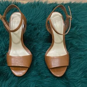 Brown pair of Aldo shoes